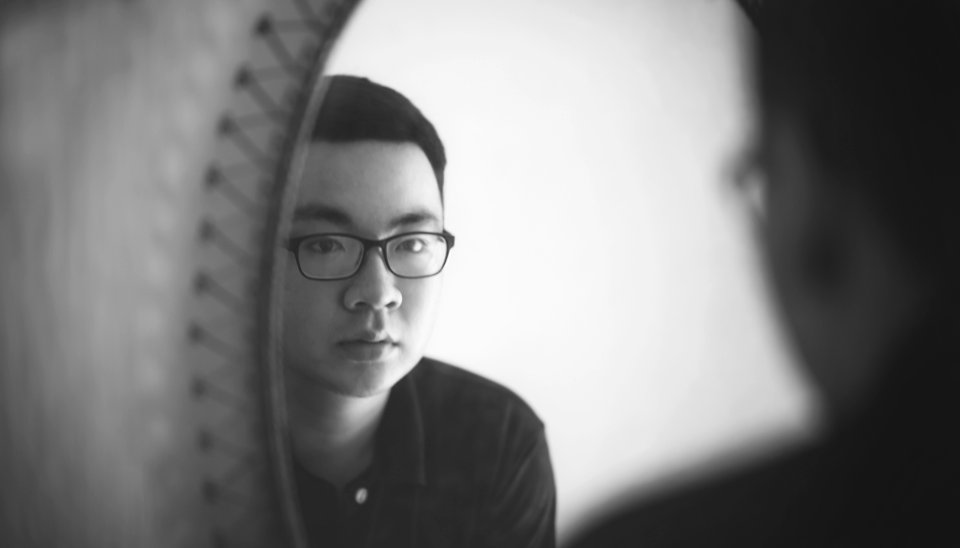 Monochrome Photography Of A Man Looking In Front Of Mirror photo