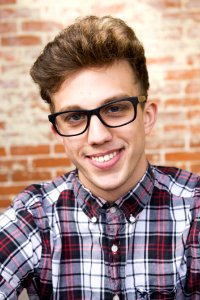 Man Wearing Eyeglasses And Smiling photo