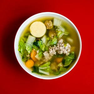 Stew With Meat And Vegetables Placed In White Ceramic Bowl photo