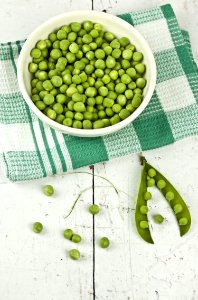Green Peas On White Ceramic Bowl photo