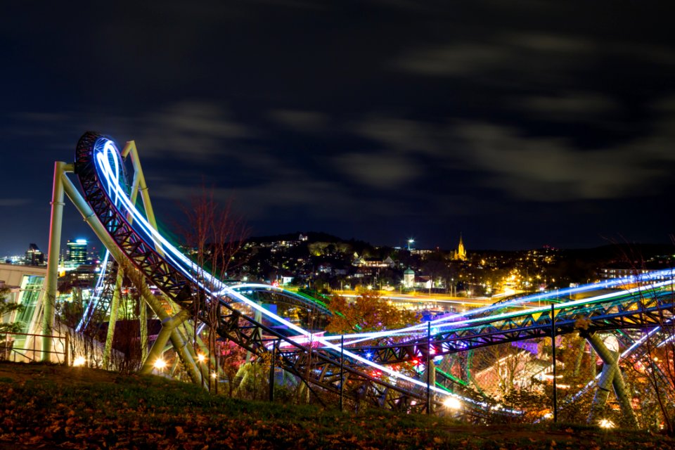 Time-lapse Photography Of Roller Coaster During Night Time