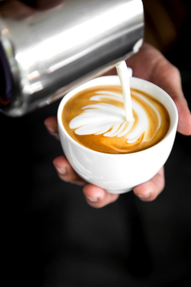 Latte In White Ceramic Cup