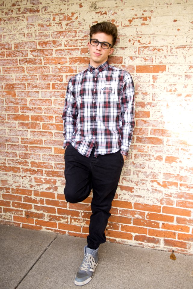 Man Wearing Red And White Plaid Dress Shirt And Black Pants