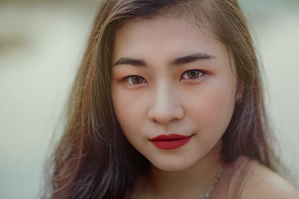 Close-Up Photography Of Woman Wearing Red Lipsticks photo