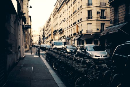 Photography Of Parked Bicycles Near Buildings