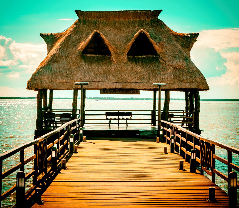 Brown Wooden Hut On Pier