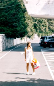 Woman Standing In The Middle Of The Road photo
