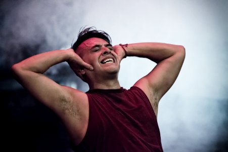 Man In Maroon Tank Top