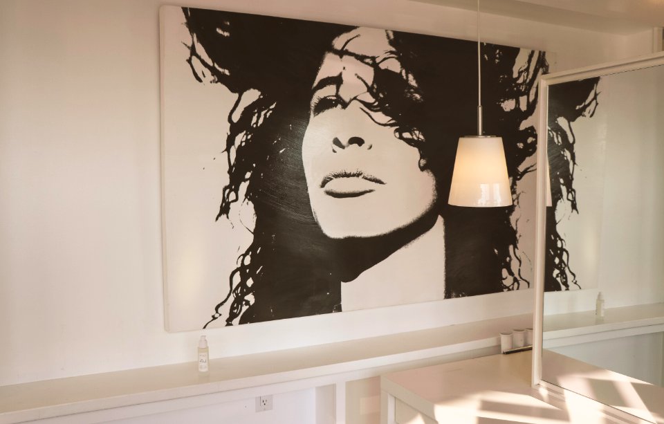 Womans Face Painting On Wall