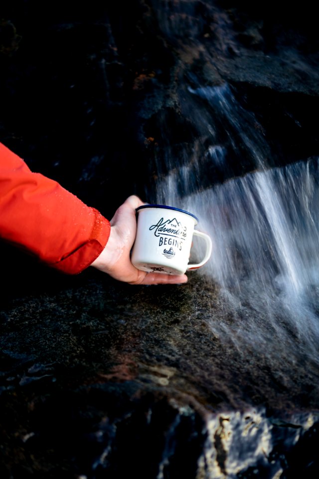 Photo Of Person Holding A Cup
