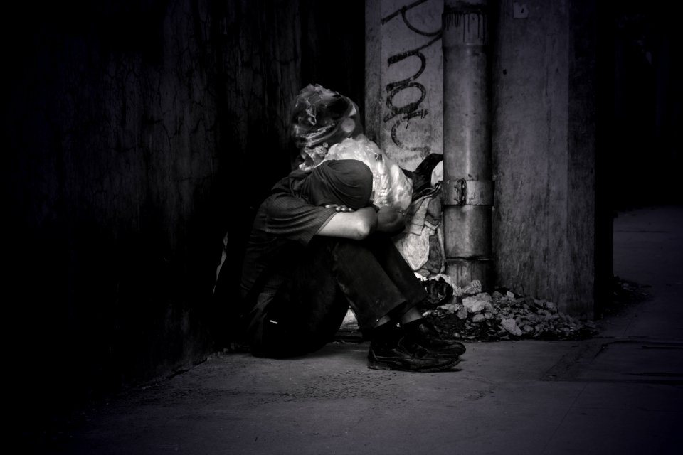 Monochrome Photo Of A Homeless Man