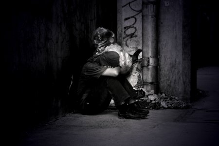 Monochrome Photo Of A Homeless Man photo