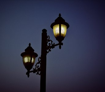 Photography Of Black Metal Post Lamp During Night Time
