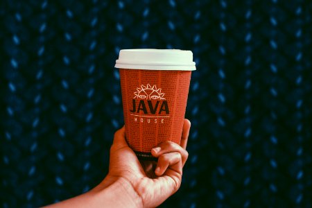 Close-UP Photography Of Paper Coffee Cup photo