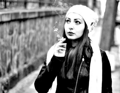 Grayscale Photography Of Woman Smoking photo