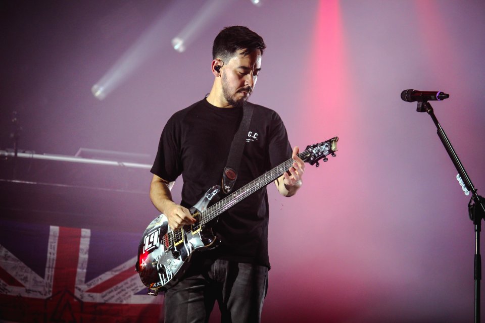 Man Wearing Black T-shirt And Playing Electric Guitar photo