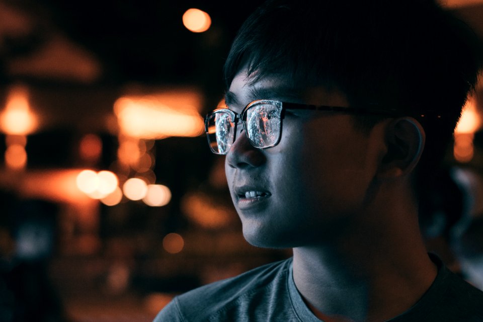 Man In Gray Shirt Wearing Eyeglasses photo