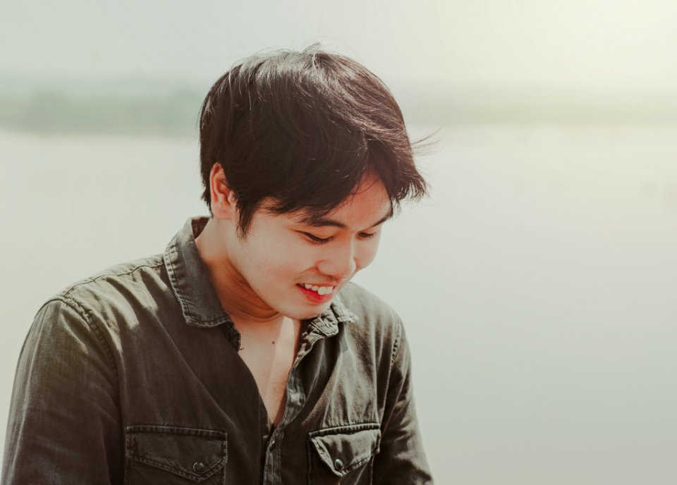 Close-Up Photography Of A Man Smiling