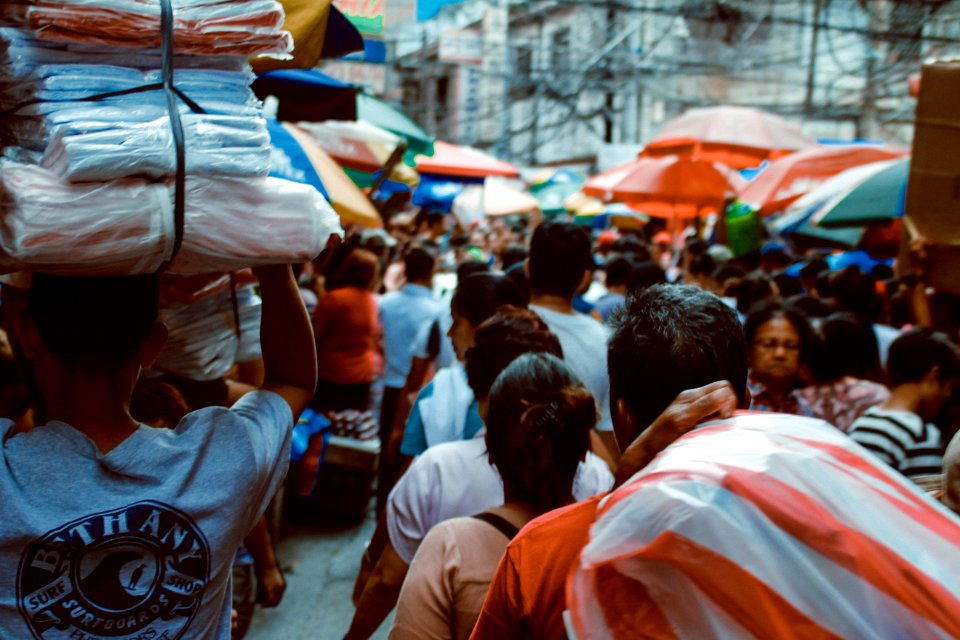 Photo Of People In The Market Place photo