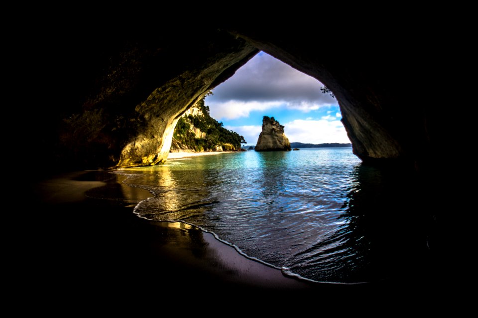 Gray And Brown Cave Near On The Ocean