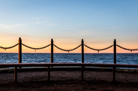 Four Metal Poles With Link Chains