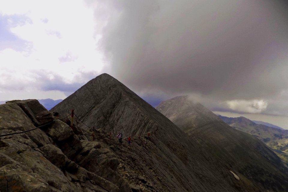 Mountain Range Under Grey Skies