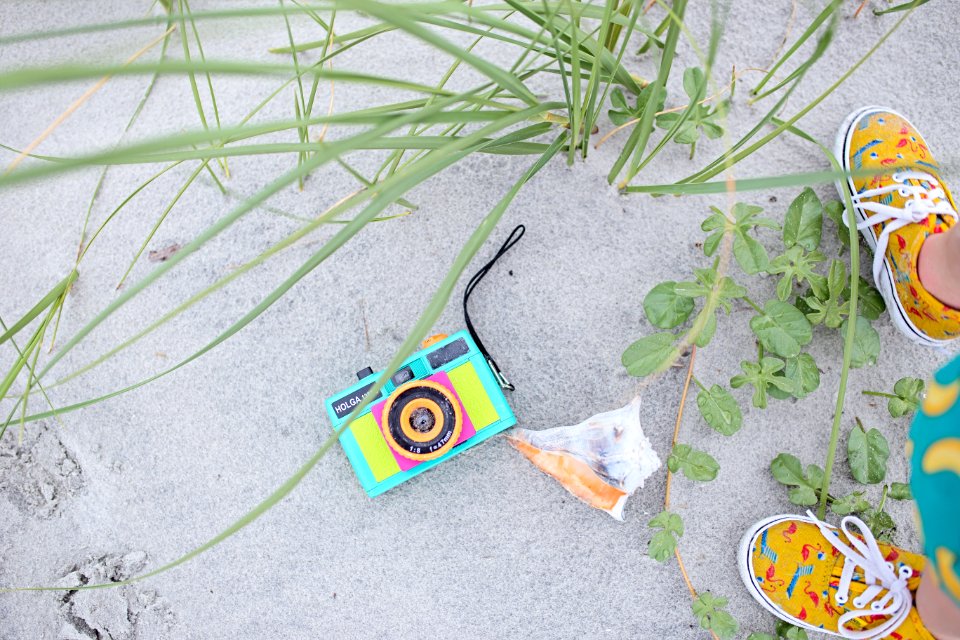 Multicolored Digital Camera With Pair Brown Shoes