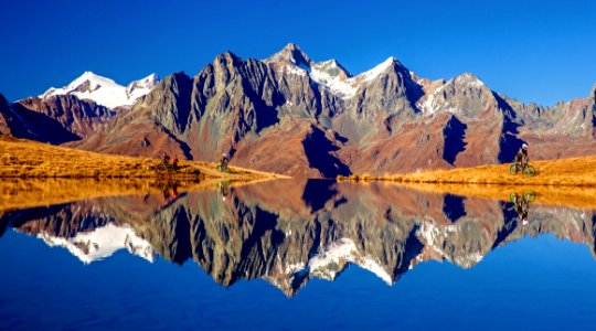 Landscape Of Brown Mountain And Lake