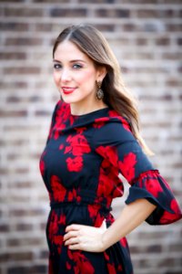 Woman In Black And Red Floral Half-sleeved Dress photo