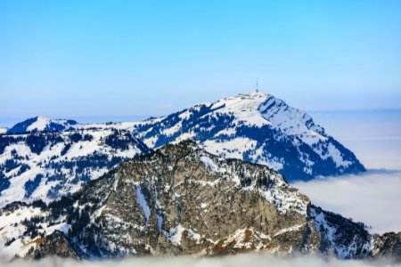 Areal Photo Of Black Snowy Mountain