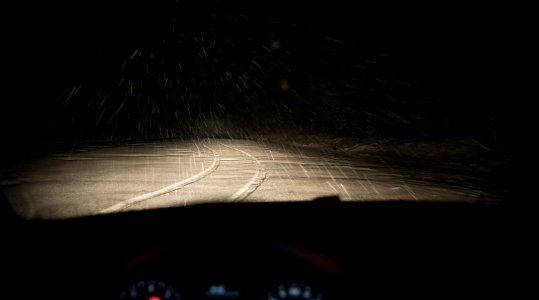 Person Taking Photo Of Road Covered With Snow