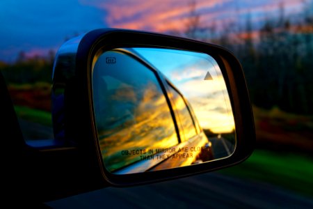 Selective Focus Photography Of Vehicle Side Mirror photo