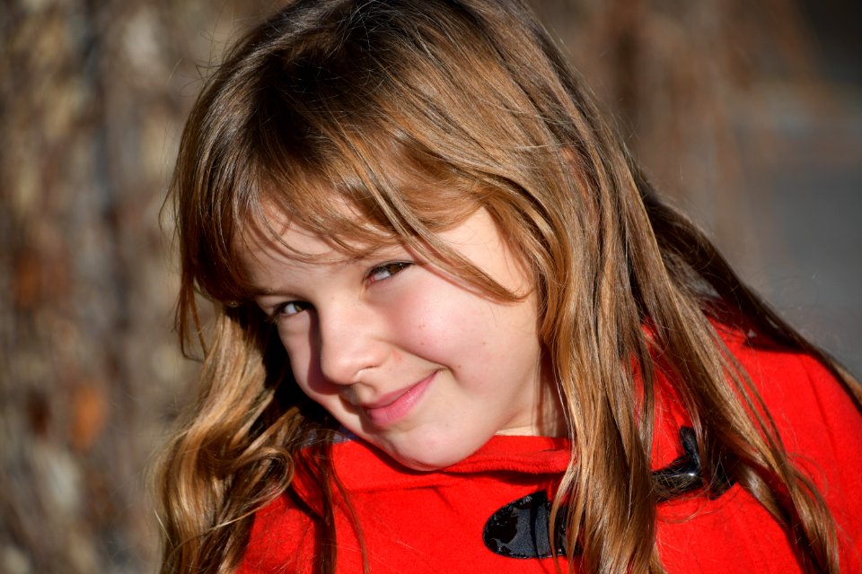 Blonde Girl Wearing Red Toggle Jacke