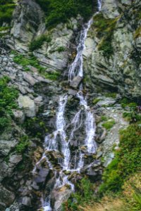 Waterfall Against The Rock photo