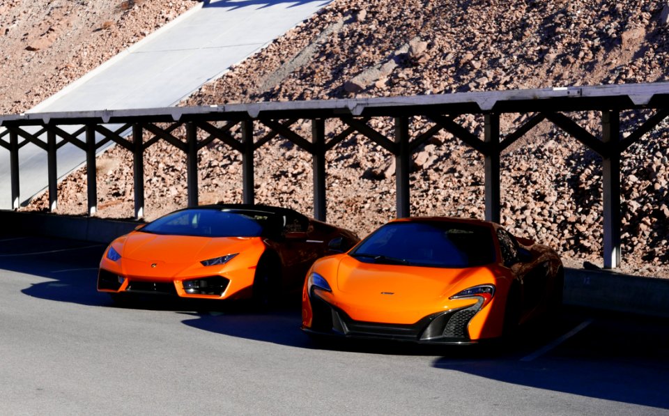 Photography Of Two Orange Sports Car photo