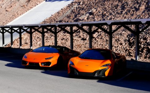 Photography Of Two Orange Sports Car photo