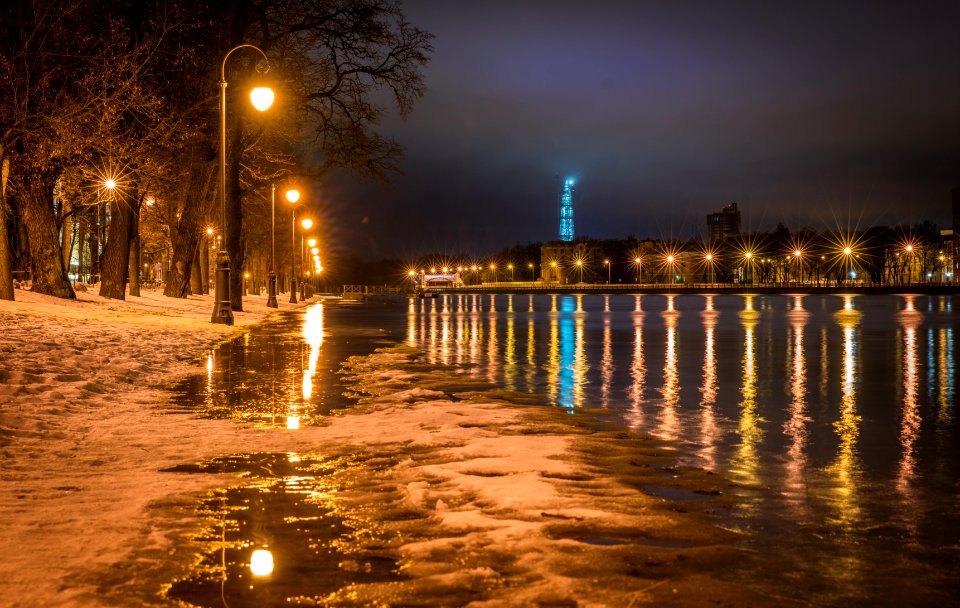 Photography Of Street Light On Seashore photo