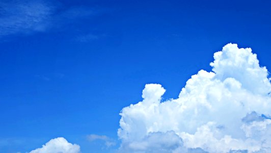 Nimbus Clouds And Blue Sky