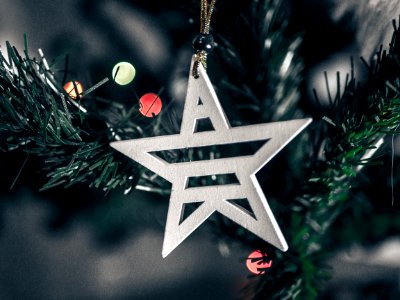Macro Shift Photography Of White Wooden Star Christmas Decor photo