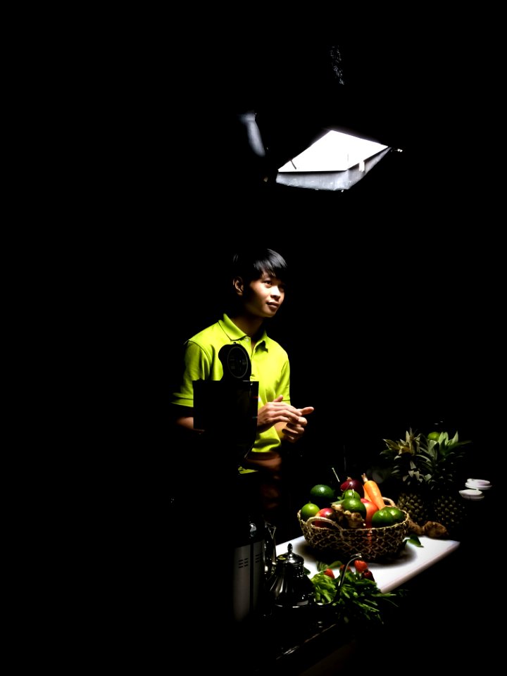 Man In Green Polo Shirt Standing