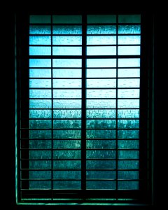 Closed Black Metal-framed Frosted Glass Windowpane photo