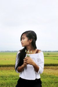 Photo Of Girl In White Off-shoulder Top