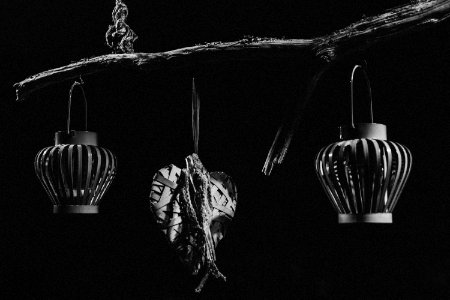 Black And White Photo Of Hanging Objects photo