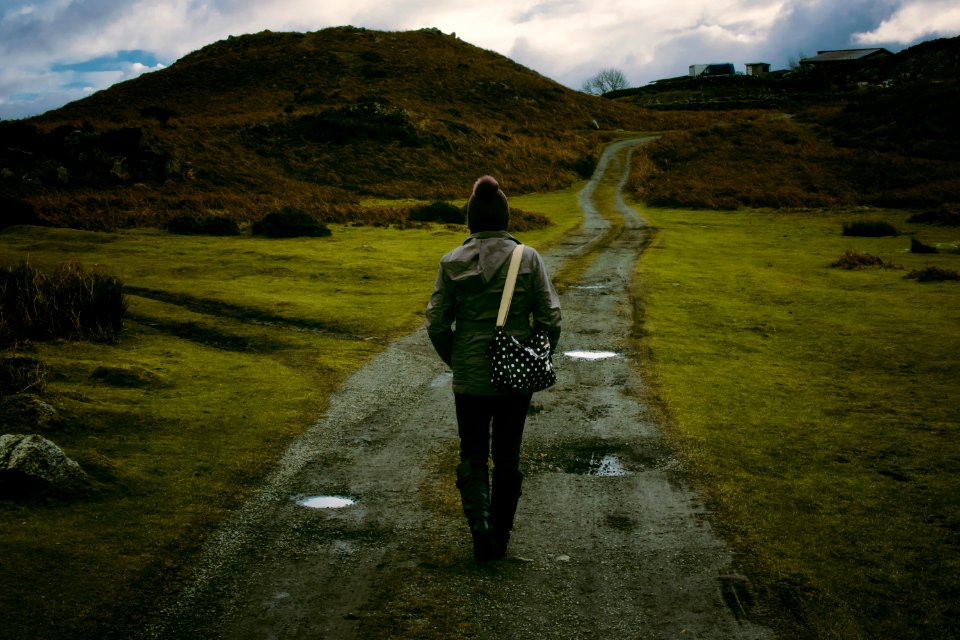 Person Standing In Pathway