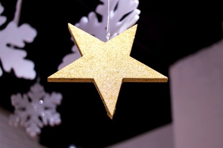 Close-up Photography Of Star Covered With Glitters photo