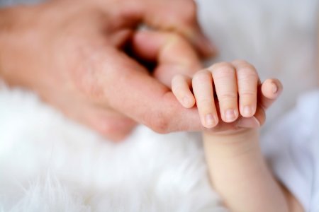 Baby Holding Its Parent Finger