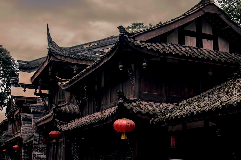 Closeup Photo Of Brown And Black Wooden Houses Digital Wallpaper