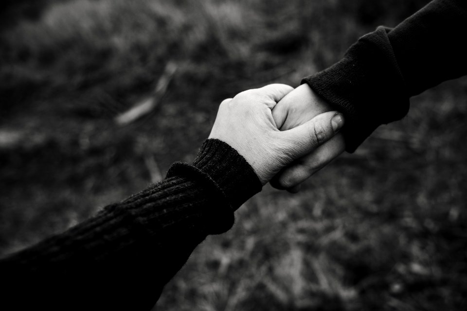 Black And White Photo Of Holding Hands