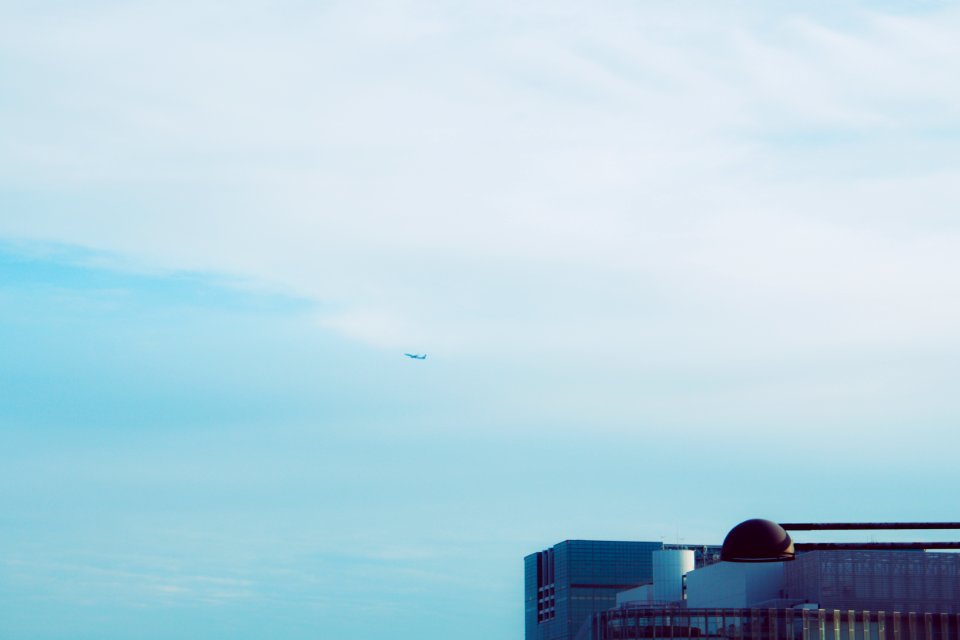Plane Flying On Blue Sky