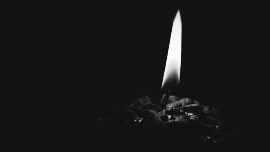 Lighted Candle Gray Scale Photo photo